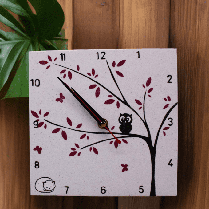 Horloge murale oiseaux rouges sur branche bois naturel