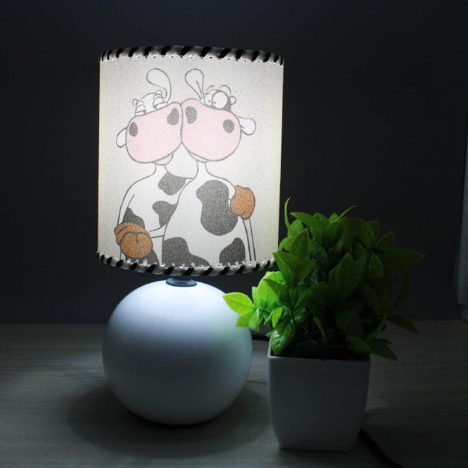 Lampe Vaches pied blanc allumée