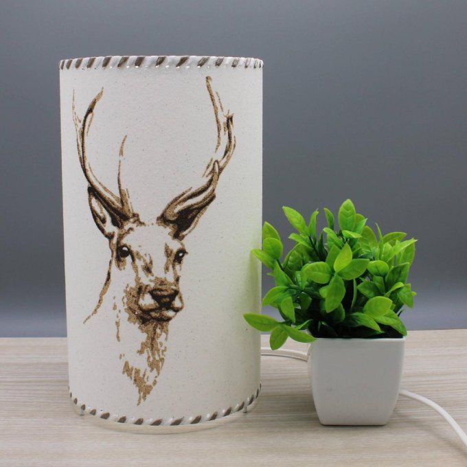 lampe artisanale en sable cerf