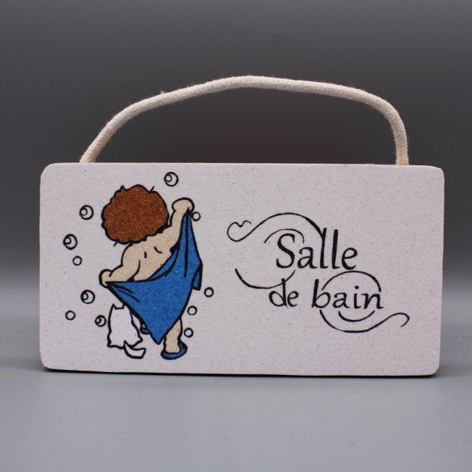 Plaque de porte Salle de bain avec un enfant et un chat en sable coloré