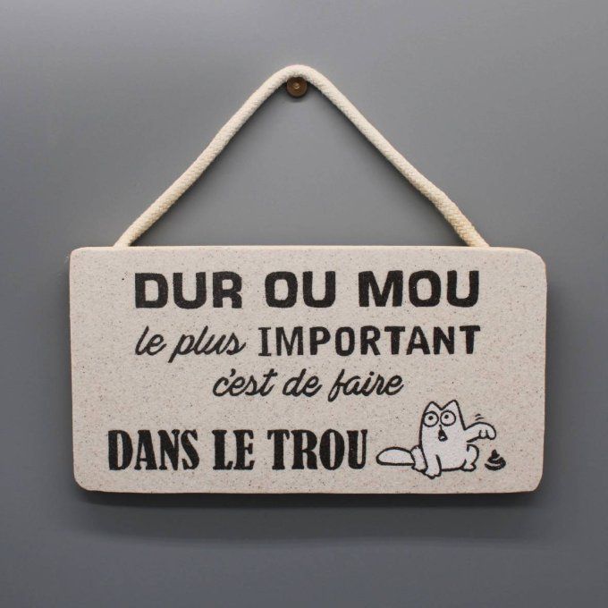 Plaque de porte Dur ou mou avec un chat en sable coloré montrant sa crotte