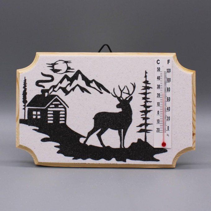 Thermomètre "Cerf" avec cerf et paysage alpin, réalisé en sable sur bois.